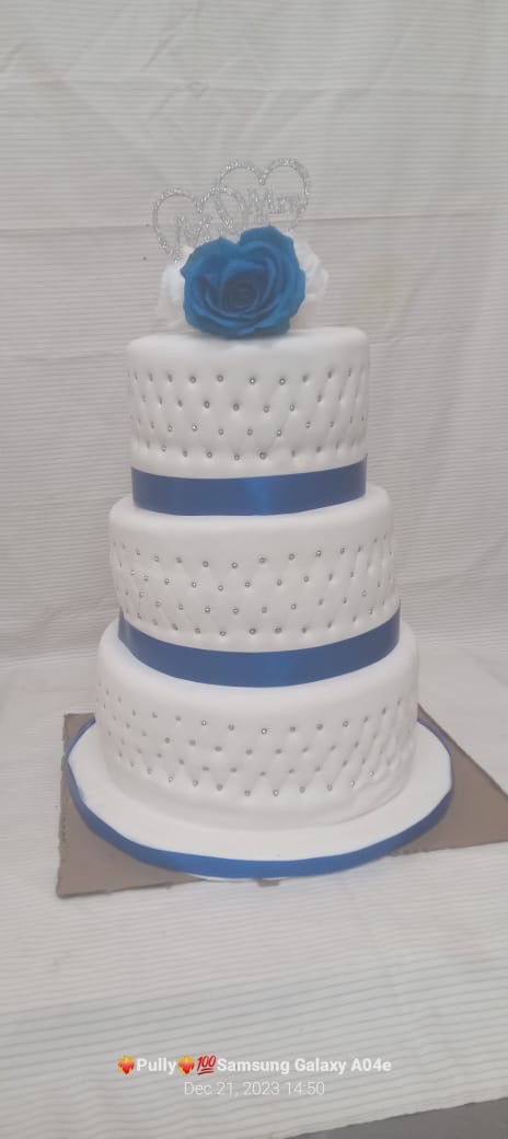 Royal Blue & White Three-Tier Wedding Cake